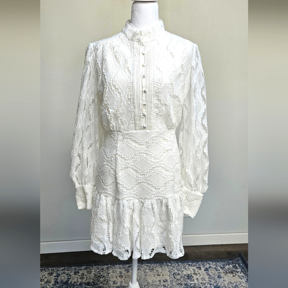 Beautiful and elegant short lace white dress. Worn ones at a baptism.